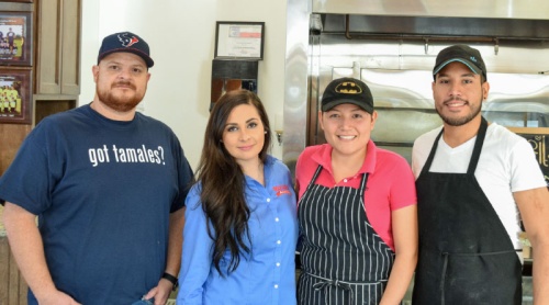 Siblings Martha (second from left) and Ruben Perez  (far left) and their family have run Marthau2019s Mexican Grill since 2016.