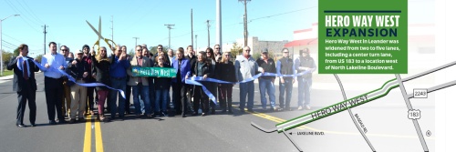 A ribbon cutting for Hero Way West was held Nov. 20 with representatives from the city, county and business community.