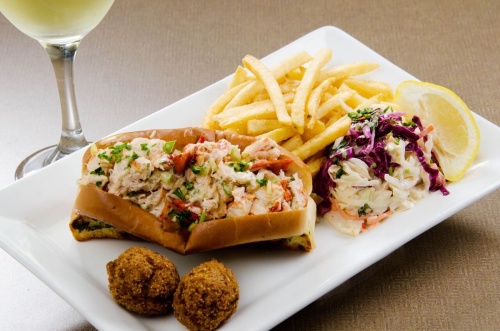 One of Sea Breeze Lobsta & Chowda House's food items includes its lobster roll.
