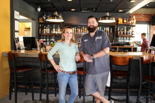From left: Caitlin and Chad Niland opened the Downtowner in December 2016, offering high-end comfort food and eclectic bar options. 