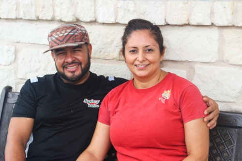 Spicy Bite owners Efrain and Ana Alvarado are active with Hays High School, which is located across the street. 