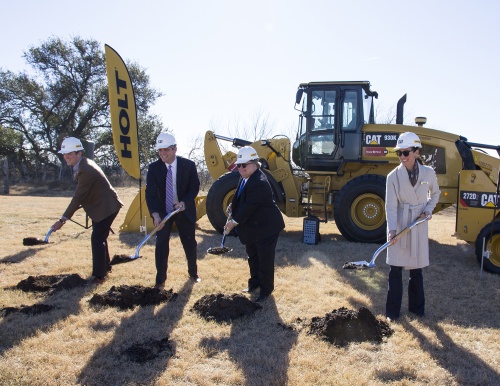 From left, Holt Cat CEO and General Manager Peter Holt, Georgetown City Manager David Morgan, Georgetown Mayor Dale Ross and Holt Cat President and Chief Administrative Officer Corinna Holt Richter mark the ceremonial start of construction Tuesday, Jan. 30, on Holt Catu2019s future Georgetown sales, rental and repair facility off Airport Road.