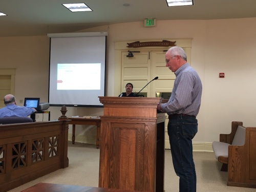 San Marcos Greenbelt Alliance president Mark Taylor presents Hays County commissioners with an update on the regional trail. 
