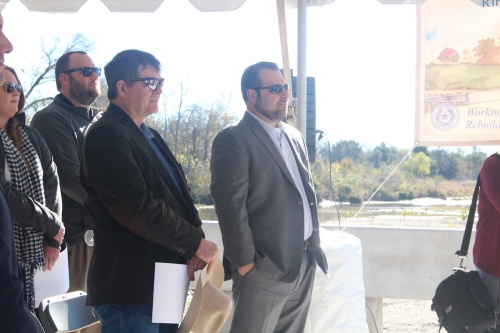 Hays County Precinct 2 Commissioner Mark Jones (left) stands next to Will Conley at a ribbon cutting in December. Jones will serve as Hays County's Capital Area Metropolitan Planning Organization representative. 