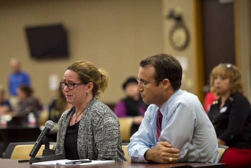 Jean Gearhart gives a tearful statement with her husband Troy Gearhart to the panel about her special needs child. U.S. Department of Education officials held a meeting in Edinburg on their tour of Texas to hear community members' experiences with special education.