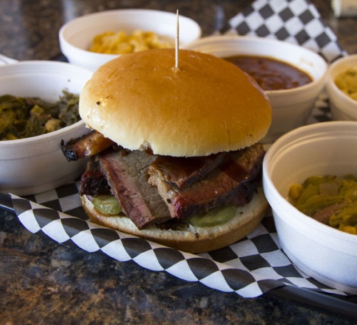 The brisket sandwich can be paired with one of 10 sides, including collard greens, macaroni and cheese, baked beans, potato salad and green beans. 
