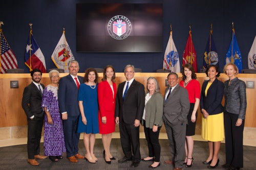 Mayor Pro Tem Kathie Tovo, fifth from left, may need to gain approval from more than 3,500 District 9 voters to be eligible for November's city council election. 