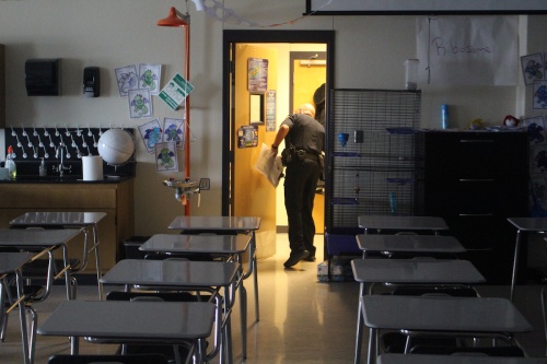 San Marcos Assistant Police Chief Robert Klett gives the all-clear in a San Marcos High School classroom during a lockdown drill.
