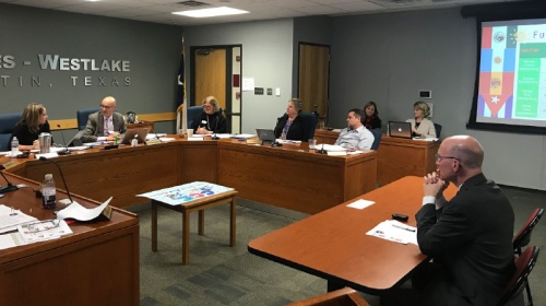 Deputy Superintendent Jeff Arnett (foreground) speaks to the Eanes ISD board of trustees about the districtu2019s Spanish immersion program Jan. 30. 