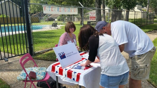 Leah Stephanow, a member of the LWV-Cy-Fair leadership team, registers voters in the Ravensway subdivision.