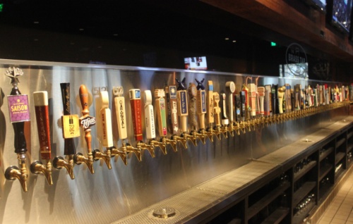 The Brass Tap has 100 craft beers on draft.