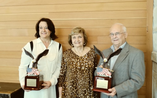 Cathy Zerwas (left), Patsy Stanley (center) and Bill Callegari pose for a photo after the awards presentation.  Zerwas accepted the award on her husband's behalf because he was traveling. 