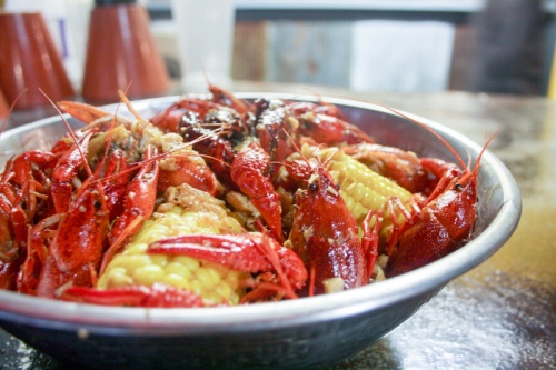Boiled crawfish pot (market price) The dish features 3 to 5 pounds of crawfish with choice of flavoring, served with corn and potatoes.