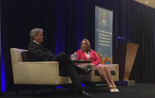 Mayor Steve Adler, left, speaks with RECA Board Chair Pam Madere during a Q&A at RECA's annual mayoral town hall Tuesday at the J.W. Marriott Hotel.