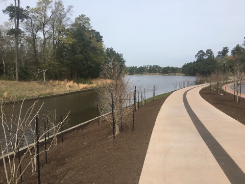 The 1.8-mile waterway features walking and biking trails and a transportation corridor to several amenities, such as The Woodlands Mall, the Woodlands Waterway Marriott, and The Cynthia Woods Mitchell Pavilion. 