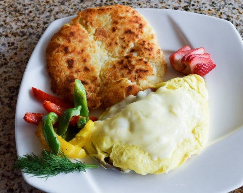 Omelette Plate, $8.50. Build-your-own omelette with home fries and choice of fillings.