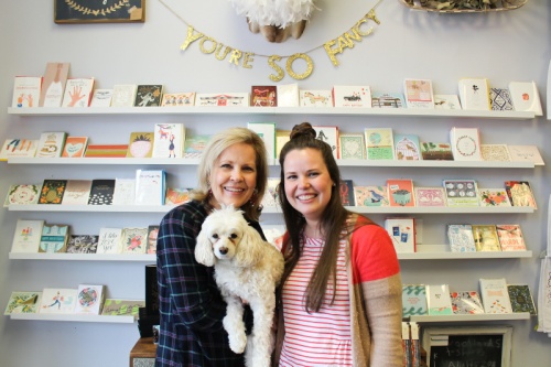 Caroline Powell (right) owns Tumbleweeds & Notions with the help of her mom, Christy (left) and dog Stella.