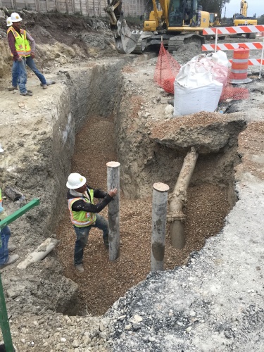 Crews work on installing water lines as part of the Bee Caves Road improvement project. 