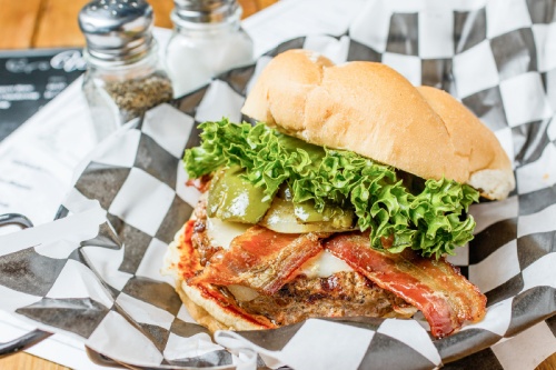 Peppe burger ($11.95) A chunk brisket and short-rib blend patty is served on a Kaiser bun with jalapeno bacon, roasted jalapeno, pepper jack cheese, lettuce, grilled onions and chili ancho mayo.