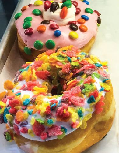 Customers can buy classic and specialty donuts, such as those with M&Ms and a variety of cereals.