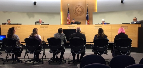 The Travis County Commissioners Court listens to a presentation on May 29.