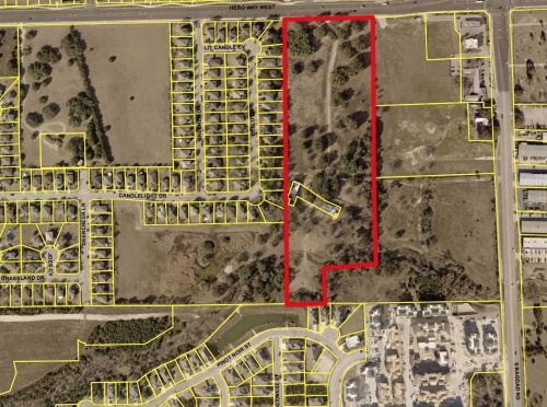 About 15.6 acres near Hero Way West and Bagdad Road was previously zoned as single-family urban. According to city documents, the landowner had requested a rezoning to general commercial, local commercial and neighborhood residential. 