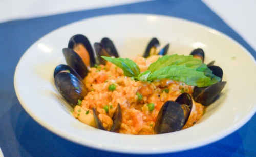 The seafood risotto dish ($19.95) includes calamari, shrimp, scallops and mussels over a bed of risotto-style rice.