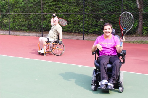 Javier de la Garza (right) and Samuel Michael Ventura get ready for tennis practice in Ridgewood Park. 