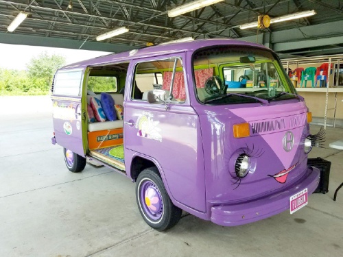 The organizationu2019s purple bus was inspired by Holly Munsingeru2019s personality. 