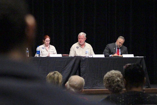 From left, Area Director Kelly Keel Linden, Enforcement Division Director Bryan Sinclair and Pearland City Council Member Trent Perez were part of a nine-member panel answering questions about the Blue Ridge Landfill on Wednesday at Shadow Creek High School.