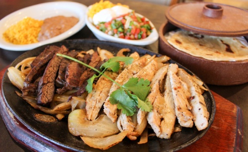 Fajitas ($28.95): Customers can share an order of fajitas with their choice of meat served with beans, rice, cheese, pico de gallo, sour cream and tortillas. 