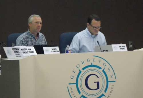 Georgetown ISD President Scott Stribling (left) and Superintendent Fred Brent as Brent gave his superintendent report during Monday's meeting. 