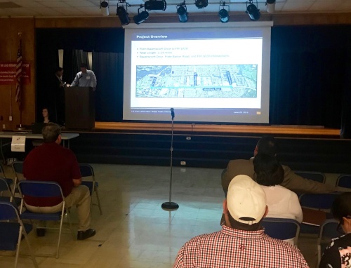 Residents listen to a presentation about the Manchaca Road widening project on June 28, 2018.