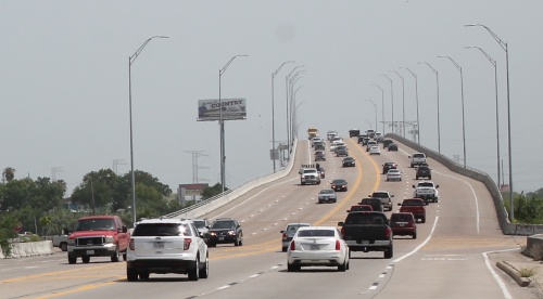 Drivers cross over the Hwy. 146 bridge between Kemah and Seabrook near Clear Lake.