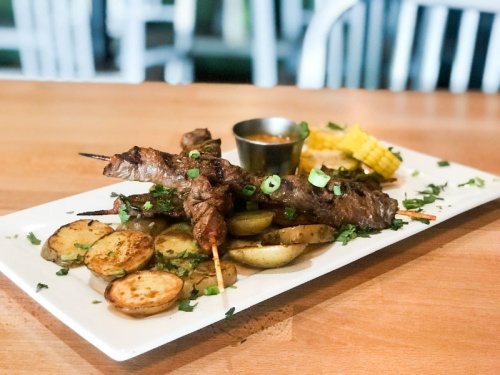 Quinoa Grill owner Christian Mariategui brought inspiration from his home, Peru, to his Round Rock restaurant. nnSteak Anticuchos ($14.99)nThis classic Peruvian dish features three skewers of marinated steak served with corn, Yukon gold potatoes and aji rocoto.