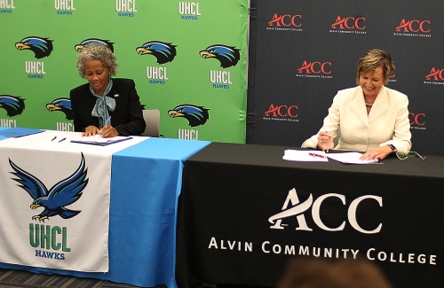 UH-Clear Lake President Ira Blake and Alvin Community College President Christal Albrecht signed the agreement on July 18. 