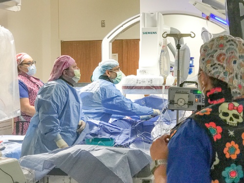 Dr. Rajesh Venkataraman,(center) an electrophysiologist, performs a procedure using new nmedical technology at Houston Methodist The Woodlands.