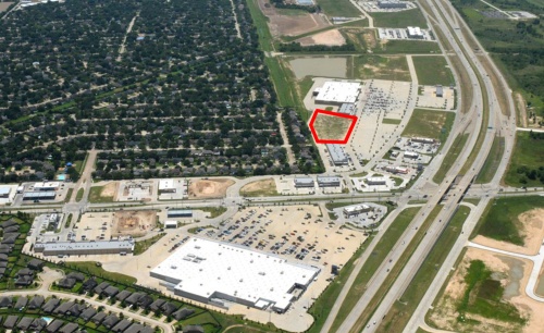 From bottom to top: Wal-Mart is located on the north side of Morton Ranch Road at the Grand Parkway. The new building will be constructed at the area outlined in red, just north of the Kroger store, which opened in 2016. 