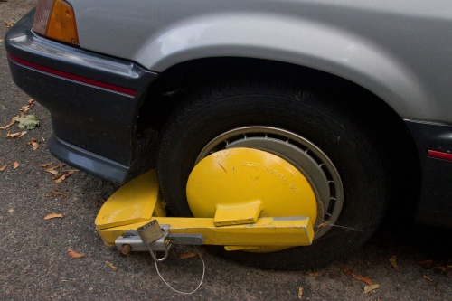 Austin City Council lowered the fee vehicle owners have to pay to have a boot removed from their vehicle. 