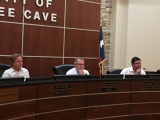 From left: Mayor Pro Tem Bill Goodwin, Mayor Monty Parker and Council Member Andrew Clark sit at the Aug. 14 Bee Cave City Council meeting.