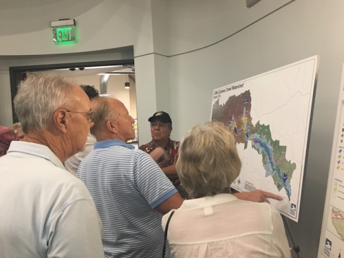 Residents gather to learn about projects affecting Little Cypress Creek at a July 31 community engagement meeting.