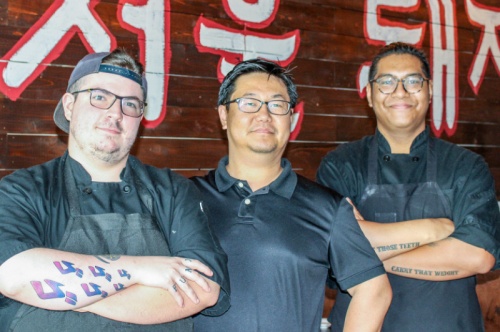 Owner Danny Kim (center) is flanked by his cooks, Kevin Simmons (left) and James Romero. Kim opened Seoul Pig a year ago when he recognized an opportunity for Korean barbecue in Pearland.