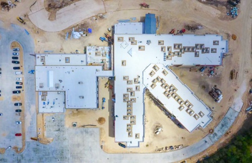 An aerial photo shows the new campus for HCISDu2019s Buda Elementary, which is under construction on Old San Antonio Road.