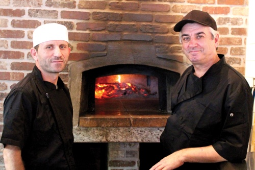 Kitchen manager Andy Rrapi (left) and owner Gjergj Delia manage Del Pietrou2019s.