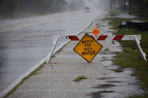After flooding rains, Lake Travis is more than 12 feet over capacity.