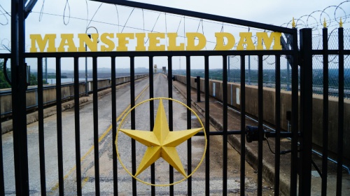 Four gates remain open at the Mansfield Dam at Lake Travis.