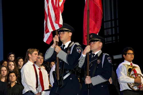 Members of the Lakeway Police Department Color Guard parade the colors.