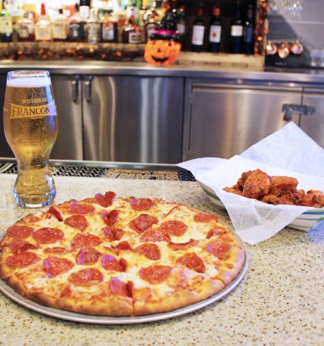 19 Degreesu2019 best sellers are pizza ($12), wings ($7) and craft beer ($5.75)