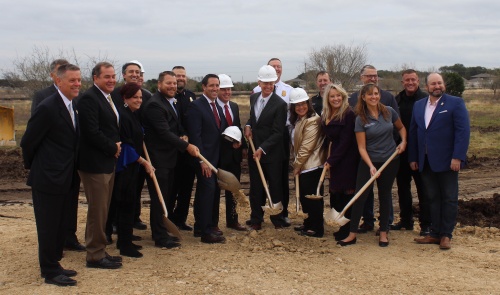 State, county and city officials and representatives from Lone Star Tangible Assets broke ground on the upcoming state-administered bullion depository in Leander.
