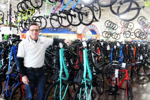 Woody Smith, owner and president of Richardson Bike Mart, joined the business as a bike technician in 1989.
